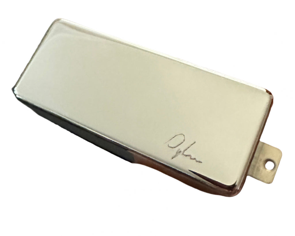 Dylan's Hand Holding a Firebird pickup in nickel