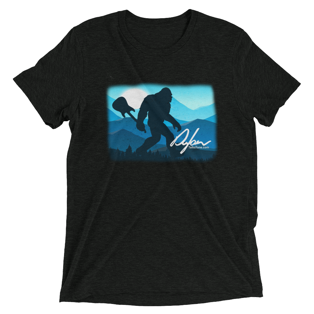 heather t-shirt with Sasquatch holding a guitar