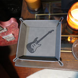 gray leatherette dump tray engraved with a strat