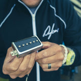 Dylan Holding a Humbucker Sized P90 with chrome ring
